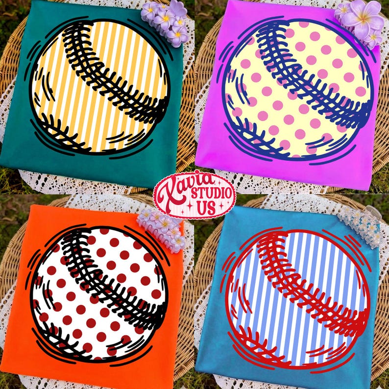 May include: Four colorful t-shirts with baseball designs. Each shirt features a baseball graphic with different patterns: yellow stripes, pink polka dots, red polka dots, and blue and white stripes. The shirts are on a wicker surface.