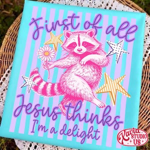 May include: A canvas print featuring a pink raccoon holding a daisy, surrounded by stars. The background has vertical stripes in light blue and purple. Text reads "First of all Jesus thinks I'm a delight."