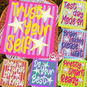 May include: A collection of colorful square art pieces with motivational phrases and star designs. The phrases include "Trust Your Self", "Test Day Mode On", "Brain Loading Please Wait", "Show What You Know", "Do Your Best", and "Pretty Smart Ready".