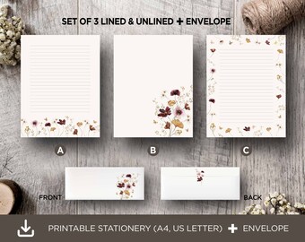 May include: Set of three printable stationery sheets with a floral design. One sheet is lined, one is unlined, and one has a floral border. The set also includes a matching envelope.