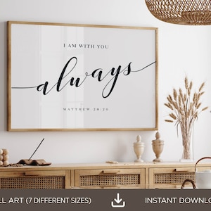 May include: A printable wall art print with a white background and black text that reads "I am with you always Matthew 28:20".