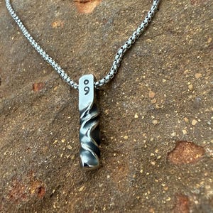 The &quot;Resilient One&quot; Stainless Steel Twist Necklace,  Protective Amulet, Twisted Pendant, Blacksmith made Pendant