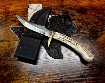 The Benefactor, handmade skinning knife. Bone handle and Mokume gane guard