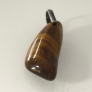 Large tiger eye pendant with 925 silver eyelet!