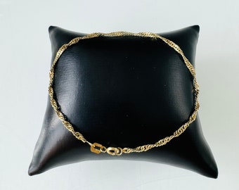 Bracelet glamour en or 14 carats au design torsadé en or jaune 585 !