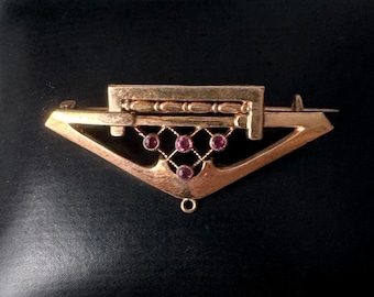 Fantastically beautiful Art Nouveau brooch with purple stones!