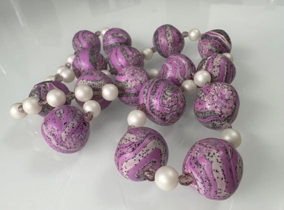 Statement necklace with large balls in a purple-g… - image 3