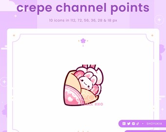 May include: A pink and white cartoon bunny rabbit is inside a crepe. The crepe is decorated with pink and white hearts and a white lace trim. The text "YUKIA SHO" is written in black on the crepe. The background is a light purple with a white border.