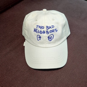 Two Bad Neighbors Simpsons Cap
