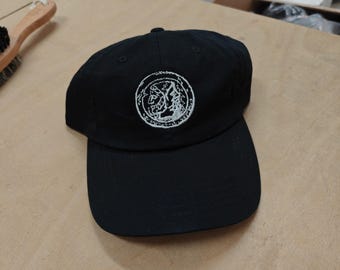Janus Coin Cap