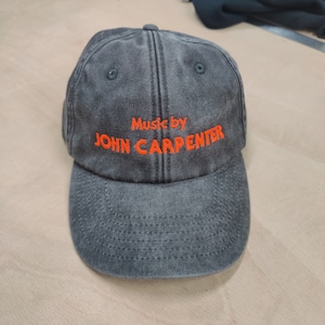 Music by John Carpenter cap