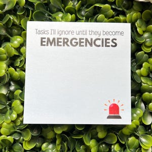 May include: White note with the text "Tasks I'll ignore until they become EMERGENCIES" and a red and black siren icon.
