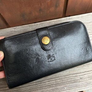 Cartera de piel de becerro negra Continental para mujer de IL Bisonte