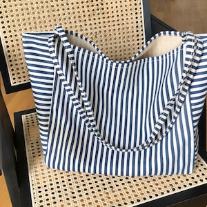 Sac fourre-tout en toile de coton rayé à rayures avec poche