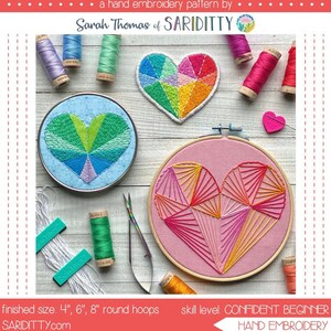 May include: A hand embroidery pattern for a Queen of Hearts design. The pattern includes two heart designs, one with a geometric pattern and the other with a rainbow color scheme. The pattern is available in 4, 6, and 8 inch hoop sizes. The pattern is labeled as a confident beginner level hand embroidery pattern. The pattern is by Sarah Thomas of Sariditty.
