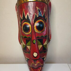 Vintage Hand Carved and Hand Painted Mask. 21" x 5"