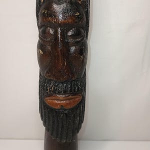 Vintage African Wooden Figurine. 1.5&quot; x 11&quot;
