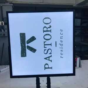 Square double sided business Sign with black frame