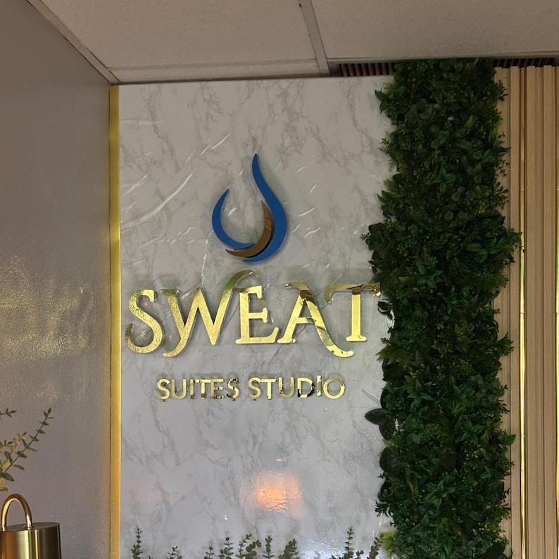 indoor sign.
made of stainless steel.
color is mirror gold.
1 inch from wall.
letter thickness is 1 inch.