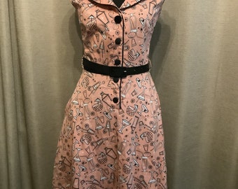 1950s pink Aline dress with cocktail print