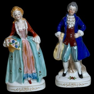 Pair of porcelain ceramic figurines stamped occupied Japan
