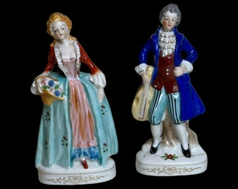 Pair of porcelain ceramic figurines stamped occupied Japan