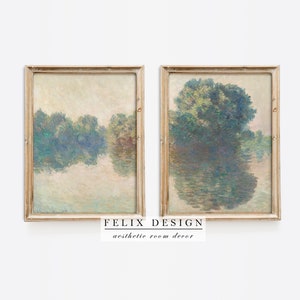 May include: Two framed landscape paintings with a vintage aesthetic. The artwork depicts a serene river scene with trees reflected in the water. The frames are gold-toned. The bottom of the image has the text "FELIX DESIGN aesthetic room decor."