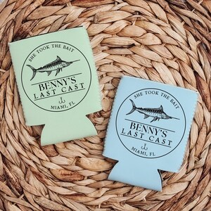 May include: Two green and blue can coolers with a marlin fish graphic and the text "She took the bait Benny's Last Cast Miami, FL".