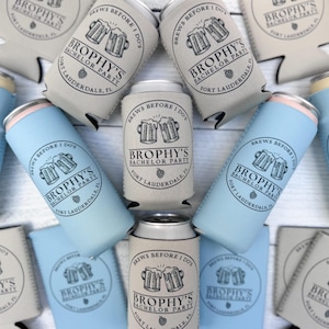 May include: A set of three ceramic mugs with a speckled, matte finish. The mugs are in shades of cream, light gray, and dark gray. Each mug has a simple, minimalist design, perfect for coffee or tea.