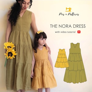 May include: An image featuring two women wearing tiered dresses. The adult's dress is olive green, and the child's is mustard yellow. The text reads "THE NORA DRESS" with a video tutorial link. A sewing pattern illustration is also shown.