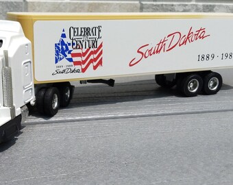 Ertl Centennial Trucks 1-64 Scale - Montana - North Dakota - South Dakota - Wyoming
