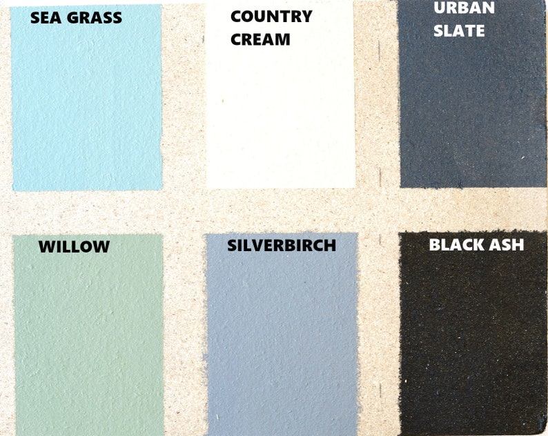 May include: A color chart with six paint samples. The colors are: Sea Grass (light blue), Country Cream (white), Urban Slate (dark gray), Willow (light green), Silver Birch (light gray), and Black Ash (black).