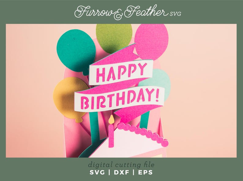 May include: A pink and green birthday card featuring a cake and balloons. The card reads "Happy Birthday!"