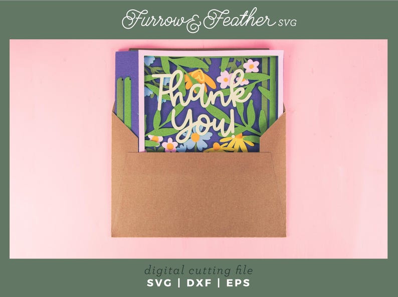 May include: A floral "Thank You" card in a brown envelope. The card features a white frame with a blue background, green leaves, and colorful flowers. The words "Thank You" are in a cursive font. The image also includes the text "Furrow & Feather SVG" and "digital cutting file SVG | DXF | EPS".