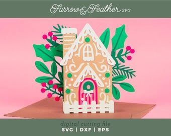 May include: A digital cutting file for a gingerbread house with white frosting and green and red holly leaves. The file is available in SVG, DXF, and EPS formats. "Furrow & Feather" is written in cursive at the top of the image.