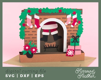May include: A 3D pop-up card featuring a fireplace with Santa Claus stuck in the chimney. The fireplace is decorated with red and green garland and stockings. There are also presents wrapped in green and pink paper.