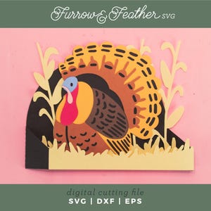 May include: A colorful paper turkey illustration with a fanned tail, standing in a field of grass and wheat. The turkey has a red wattle, blue head, and brown body. The image includes the text "Furrow & Feather SVG" and "digital cutting file".
