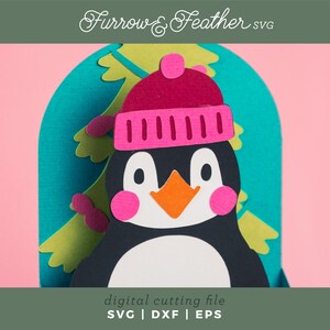 May include: A digital cutting file featuring a penguin wearing a pink and white hat with a blue and green background. The file is available in SVG, DXF, and EPS formats.