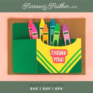 May include: A digital cutting file design for a thank you card featuring a box of crayons with the words "Thank You!" on the front.