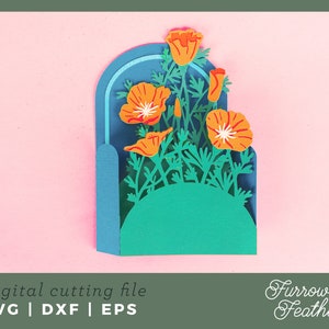 May include: A digital cutting file featuring a blue and green archway with a cluster of orange California poppies. The file is available in SVG, DXF, and EPS formats. The text "Furrow & Feather" is visible in the bottom right corner.