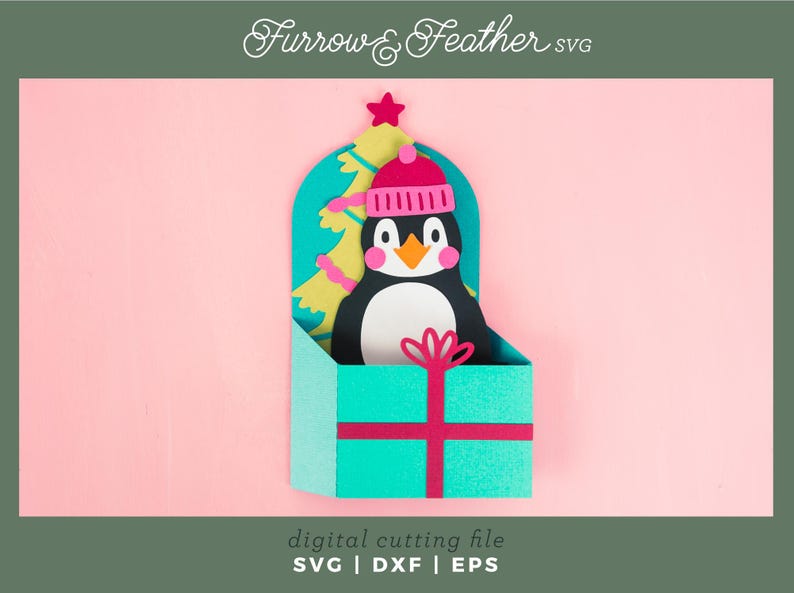 May include: A teal gift box with a pink ribbon and a penguin wearing a pink hat peeking out of the top. The penguin is standing in front of a green Christmas tree with yellow lights. The background is pink.