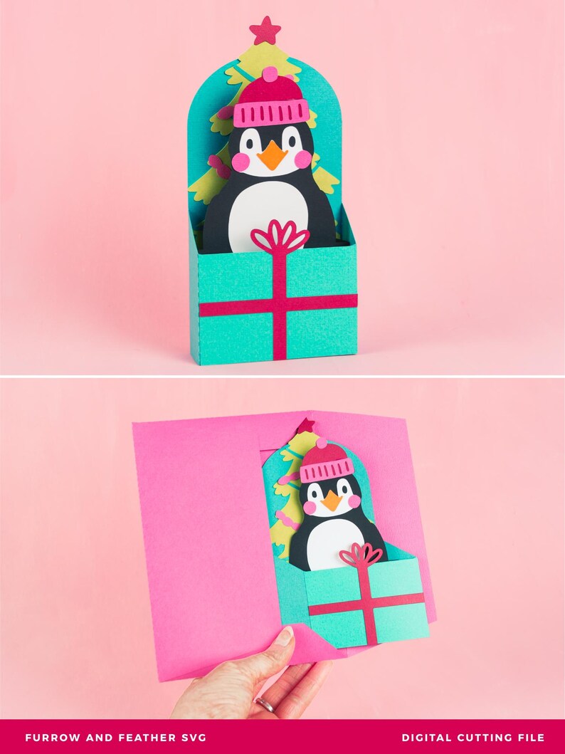 May include: A pop-up card featuring a penguin wearing a pink hat and sitting in a gift box. The penguin is in front of a green Christmas tree. The card is open and the penguin is popping up.