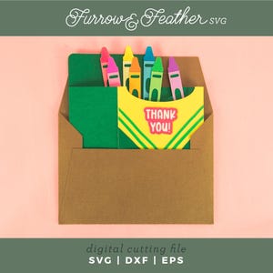May include: A brown envelope with a green and yellow card inside. The card has a box of crayons with the text "Thank You!" on the front.