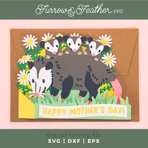 May include: A papercraft Mother's Day card depicting a mother opossum with three babies, daisies, and grass. The card has the text "HAPPY MOTHER'S DAY!" in yellow. The design is a digital cutting file.