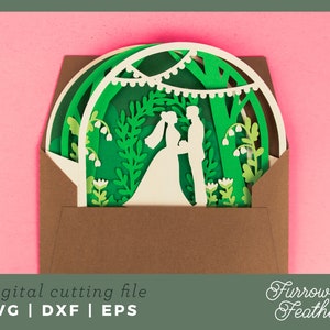 May include: A digital cutting file for a wedding invitation featuring a couple standing under a leafy archway with string lights. The design is in a brown envelope with the text "Furrow & Feather" in white cursive.