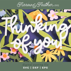 May include: A paper art design with the words "Thinking of You" in white script. The design features colourful paper flowers and leaves against a dark blue background. The words "digital cutting file" and file types are at the bottom.