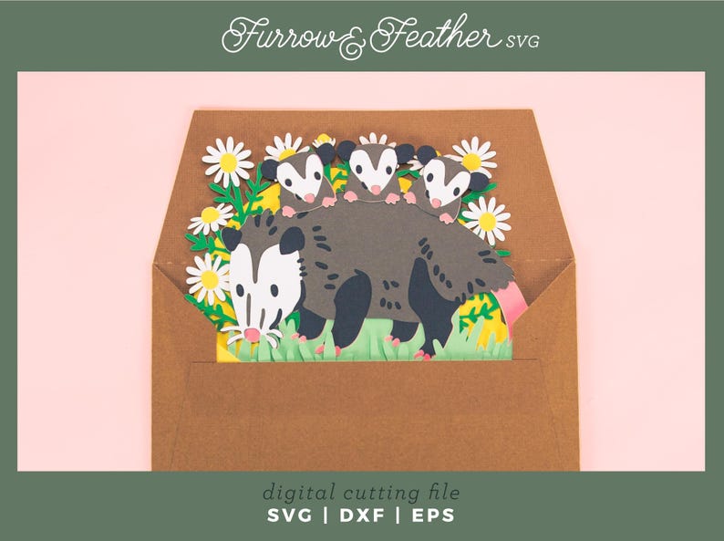 May include: A papercraft design of an opossum family in a brown envelope, with white daisies and green grass. The opossums are grey and white. The design includes the text "Furrow & Feather SVG" and "digital cutting file SVG | DXF | EPS".