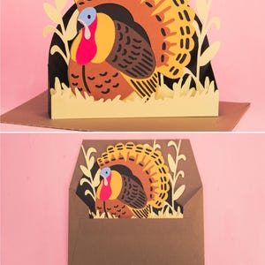 May include: A colorful paper turkey design with a fanned tail, set against a pink background. The turkey is in a grassy setting, with the text "FURROW AND FEATHER SVG" and "DIGITAL CUTTING FILE" at the bottom. The turkey is also shown inside a brown envelope.