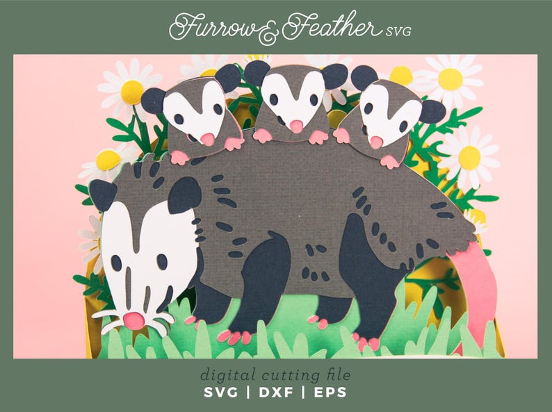 May include: A papercraft design showing a mother opossum with three babies, set amongst daisies and grass. The opossums are grey with white faces and pink paws. The image includes the text "Furrow & Feather SVG" and "digital cutting file".