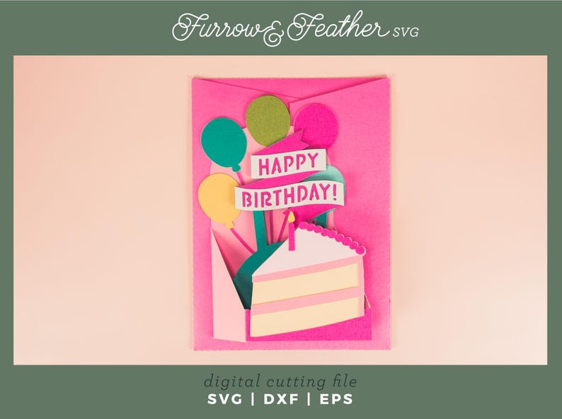 May include: A pink card with a pop-up cake and balloons. The cake is white with pink icing and the balloons are green, yellow, and blue. The card says "Happy Birthday!" in pink letters.